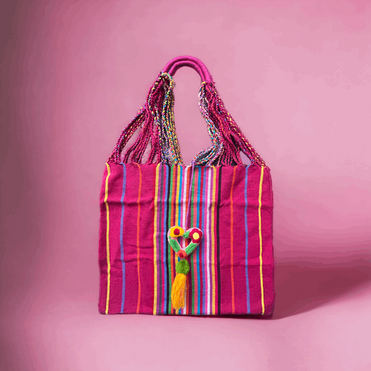 A vibrant Handmade Cotton Bucket Bag. A burst of colors that captivates the eye from Oaxaca Mexico